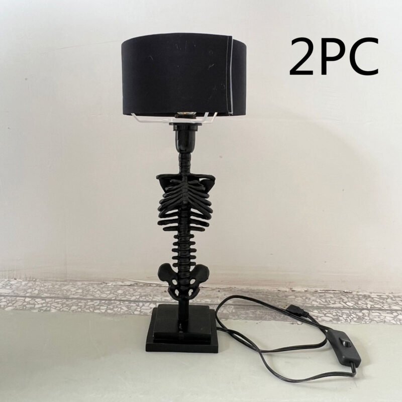 5a1a88be-e7a9-40b2-836f-c96ee81fbf62.jpg Lampe de Table Colonne Vertébrale en Résine