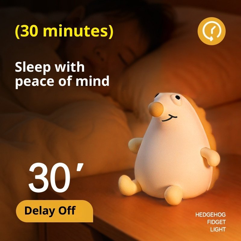 5e015b9e-c5f3-41d4-b948-583673640d60_trans.jpeg Veilleuse Hérisson en Silicone Rechargeable