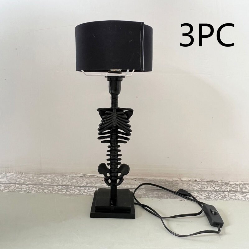 7b36f8ef-5a02-4073-b1dc-69dc86f4b709.jpg Lampe de Table Colonne Vertébrale en Résine