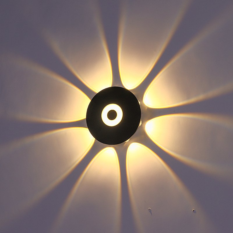 9f700205-94f6-43ad-ba65-3867e71fdeba.jpg Applique Murale Moderne à Effet Lumineux Quadridirectionnel